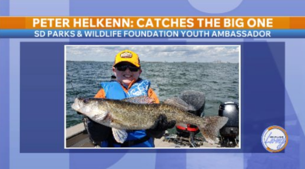 Youth Ambassado Peter with fish