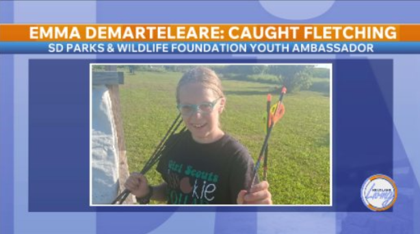 Youth Ambassador Emma with arrow
